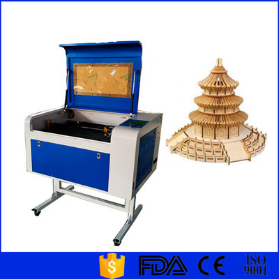 China Cuero de papel enfriamiento de la agua en circulación de la máquina del grabador del laser del CO2 de 60 vatios proveedor